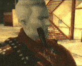 a man is holding a gun in his mouth in front of stairs