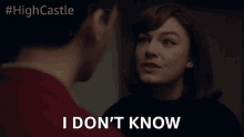 a woman says i don 't know in front of a man