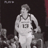 a basketball player wearing a butler jersey with the number 13 on it