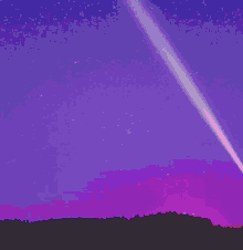 a purple sky with stars and a plane trail