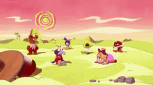 a group of stuffed animals are sitting in a field with a drum .