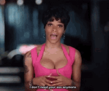 a woman in a pink dress is holding a drink and saying i don t need your ass anymore .
