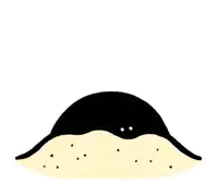a black cat with yellow eyes is sitting on top of a pile of dirt .
