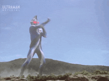 a giant robot is standing in the middle of a field with a purple light coming out of it .