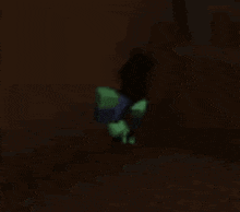 a glow in the dark zombie is standing in the dark .