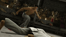 a man is jumping over another man who is laying on the floor