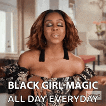 a woman in a black and gold dress says black girl magic all day every day