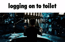 a man is sitting in a dark room with the words logging on to toilet above him