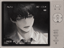 a black and white photo of a boy with the date 02-1314