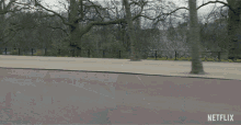 Riding A Motorcycle The Crown GIF - Riding A Motorcycle The Crown Strolling GIFs