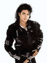 a man wearing a black jacket with the letter p on the sleeve
