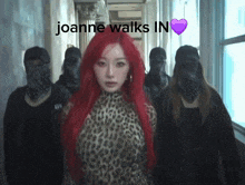 a woman with red hair stands in a hallway with a purple heart that says joanne walks in on it