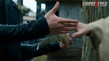 Grabbing Sword Snake Eyes Movie GIF - Grabbing Sword Snake Eyes Movie Touching Blade GIFs