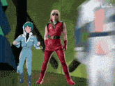 a man in a red outfit is standing next to another man in a blue outfit