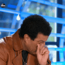 Wiping Tears Lionel Richie GIF - Wiping Tears Lionel Richie Idols Global GIFs