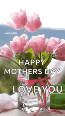a bouquet of pink flowers in a vase with the words `` happy mothers day love you '' .