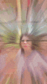 a woman 's face is visible behind a sign that says gin