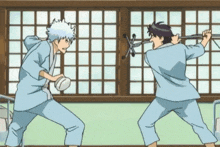 two anime characters are fighting each other with swords in front of a window