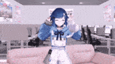 a girl with blue hair is standing on a pink couch in an office