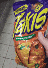 takis nacho explosion rolled tortilla chips bag of takis