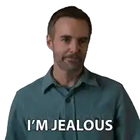 a man in a blue shirt says i 'm jealous on a white background
