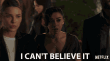 a woman says i can 't believe it in front of a netflix logo