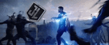 a man is standing in front of a crowd of people holding a sign that says justice league on it .