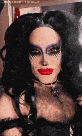 a close up of a drag queen 's face with vonxodd tumblr written in the upper right corner