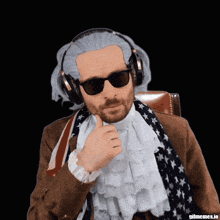 a man wearing a wig and sunglasses giving a thumbs up