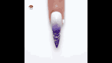 a person is cutting a nail with scissors .
