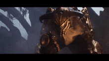 a man in armor stands in front of a giant monster with horns
