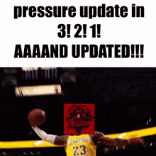 a basketball player with the number 23 on his jersey is jumping in the air