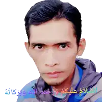 a man wearing a blue shirt and a grey jacket with arabic writing on the bottom