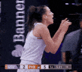 a female basketball player screams during a game against phx