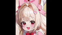 a little girl with a pink bow and a pink bunny pin