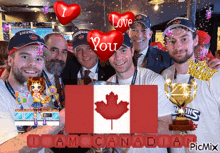 a group of men posing for a picture with a canadian flag in the background
