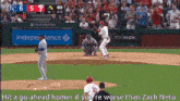 a baseball game is being played in front of a citizens bank park banner