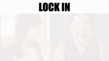 a blurred image of a woman and a man with the words lock in above them