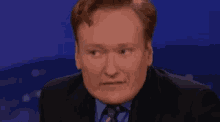 Conan O Brien Look Left And Right GIF - Conan O Brien Look Left And Right Suspicious GIFs