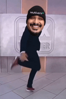 a man wearing a black beanie with the word multivers on it