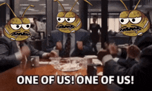 a group of men are sitting around a table and one of them says one of us one of us