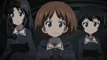 three anime girls are sitting next to each other and one is wearing headphones