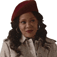 a woman wearing a trench coat and a red beret