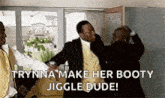 a group of men are standing next to each other in a room and one of them is yelling at the other .