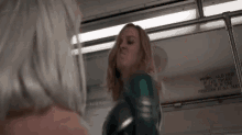Punched Captain Marvel GIF - Punched Captain Marvel Mad GIFs