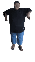 a man in a black shirt and blue pants is jumping in the air with the words pura pura puasa dlu bolo behind him