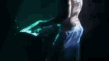 a blurry image of a person dancing in a dark room