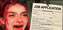 a girl with red hair is crying next to a job application