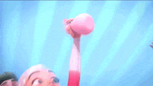 a group of cartoon characters are standing next to each other in the air .