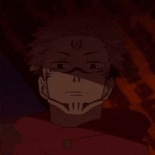 a close up of a person 's face in a dark room